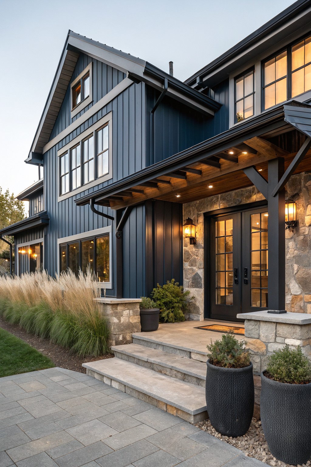 A house exterior painted in deep navy blue siding with stone accents around the entrance.
