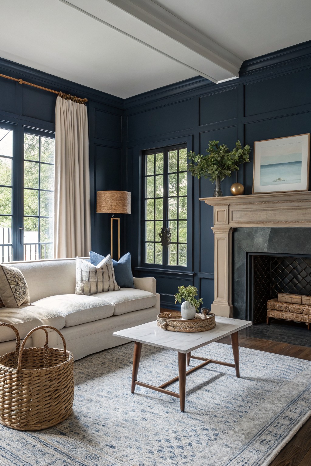 Cozy living room with navy walls, beige sofa, earthy decor, and modern coffee table.