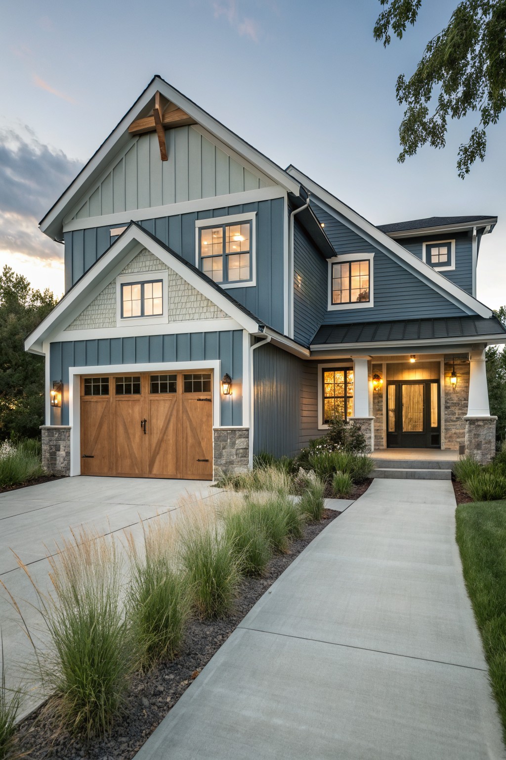 A house with soft blue-gray siding and white trim.