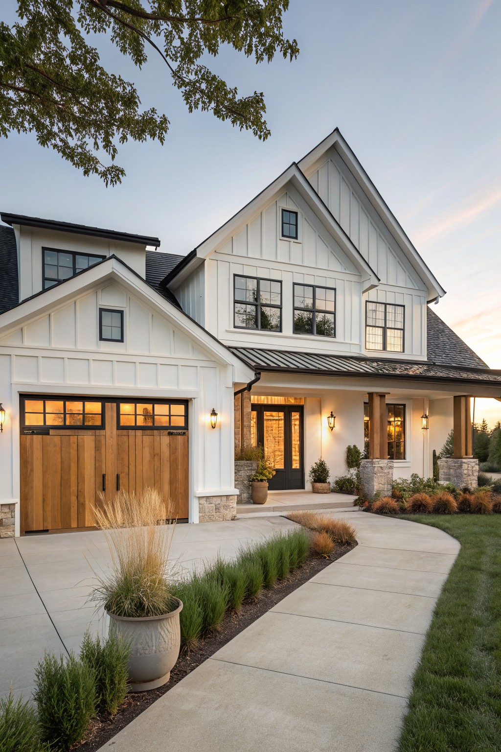 A house exterior with crisp white siding and wooden garage doors.