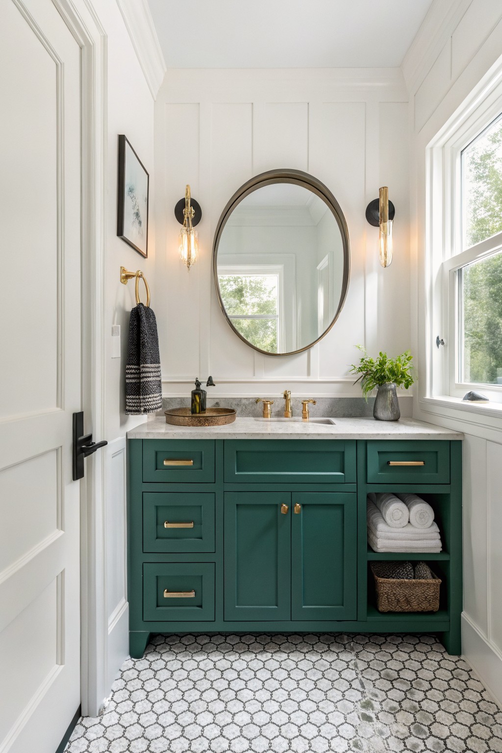 A bathroom vanity painted deep teal green with white walls and marble countertop.