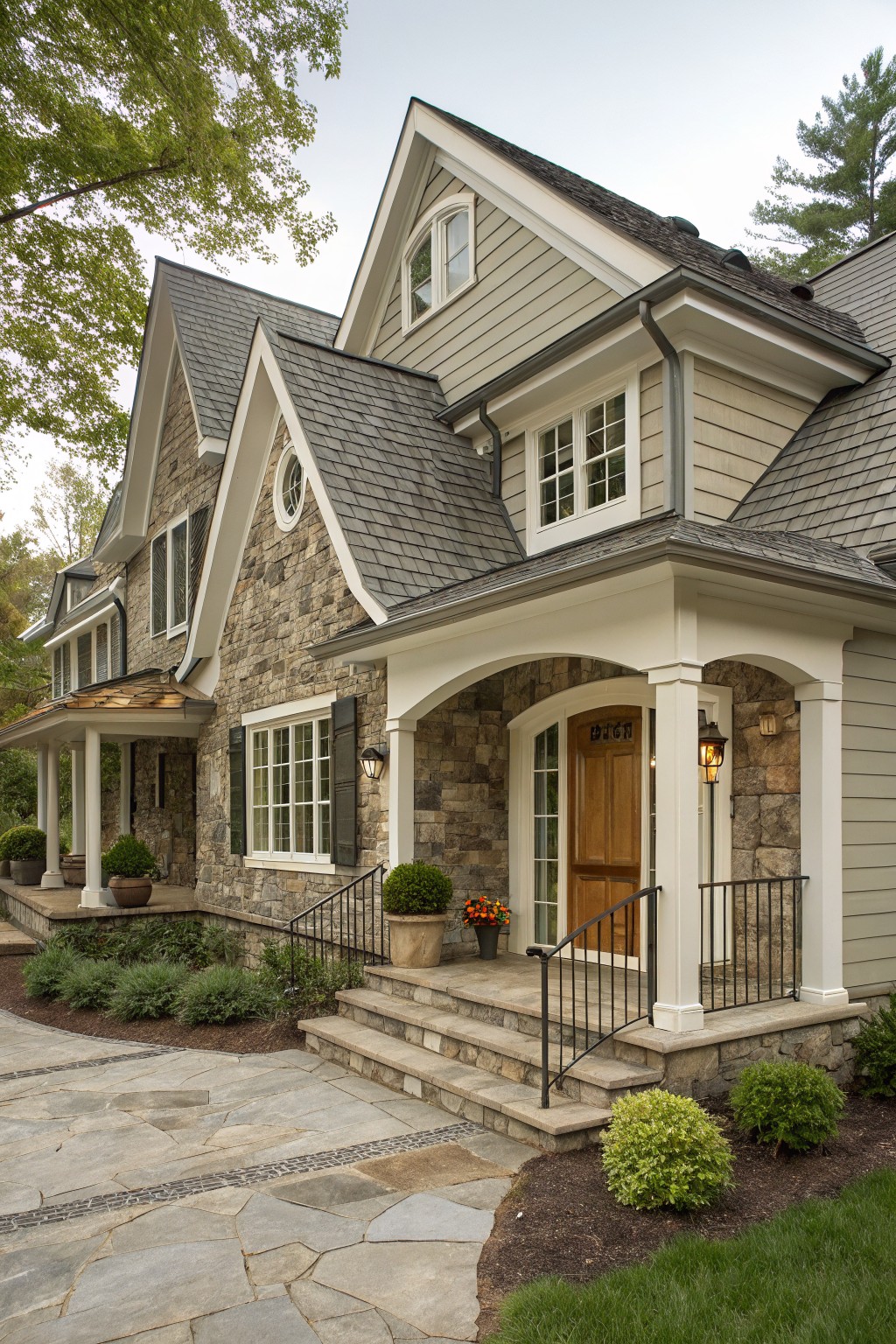 Light greige siding on a farmhouse exterior with white trim.