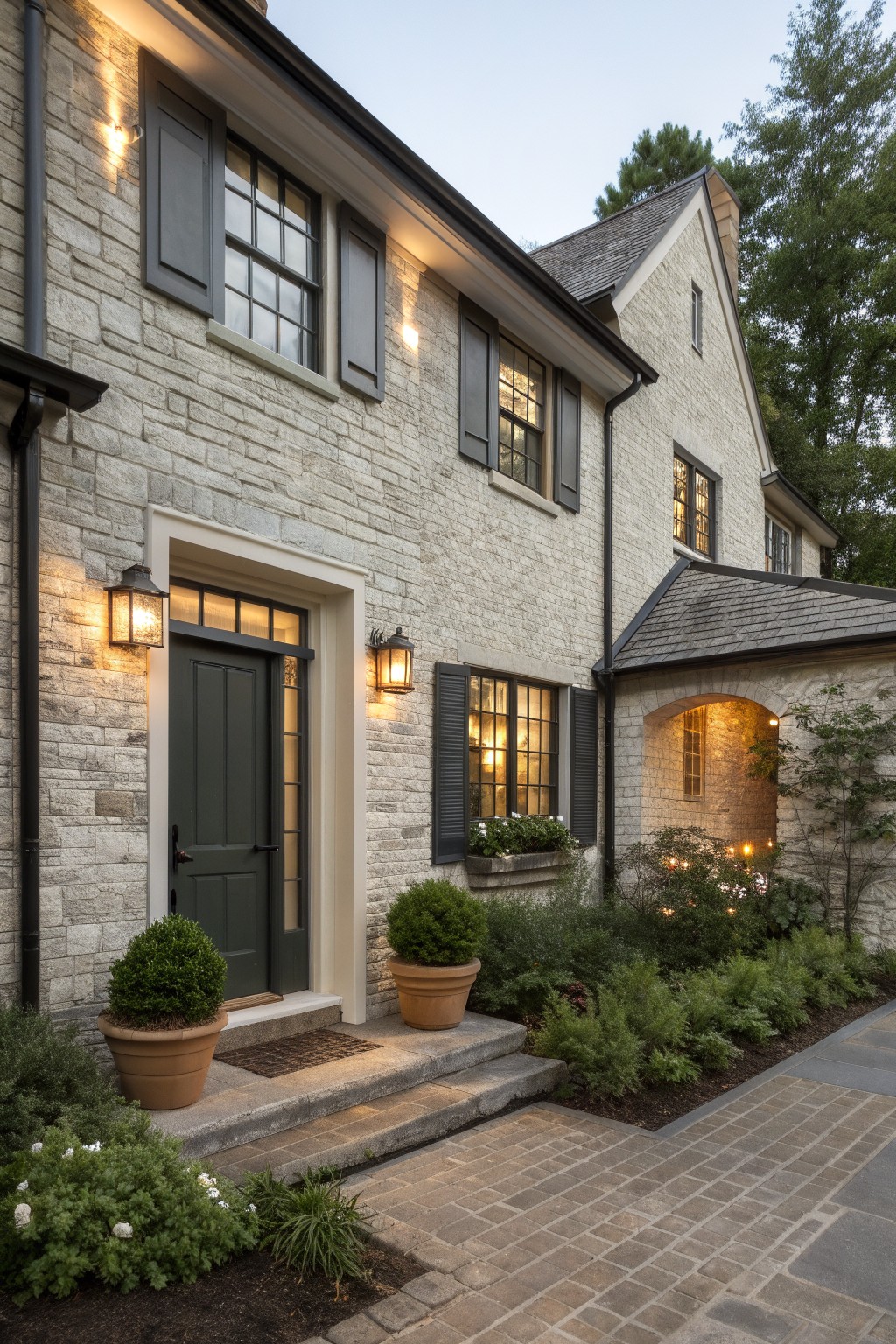 Light gray painted stone on the exterior of a farmhouse.