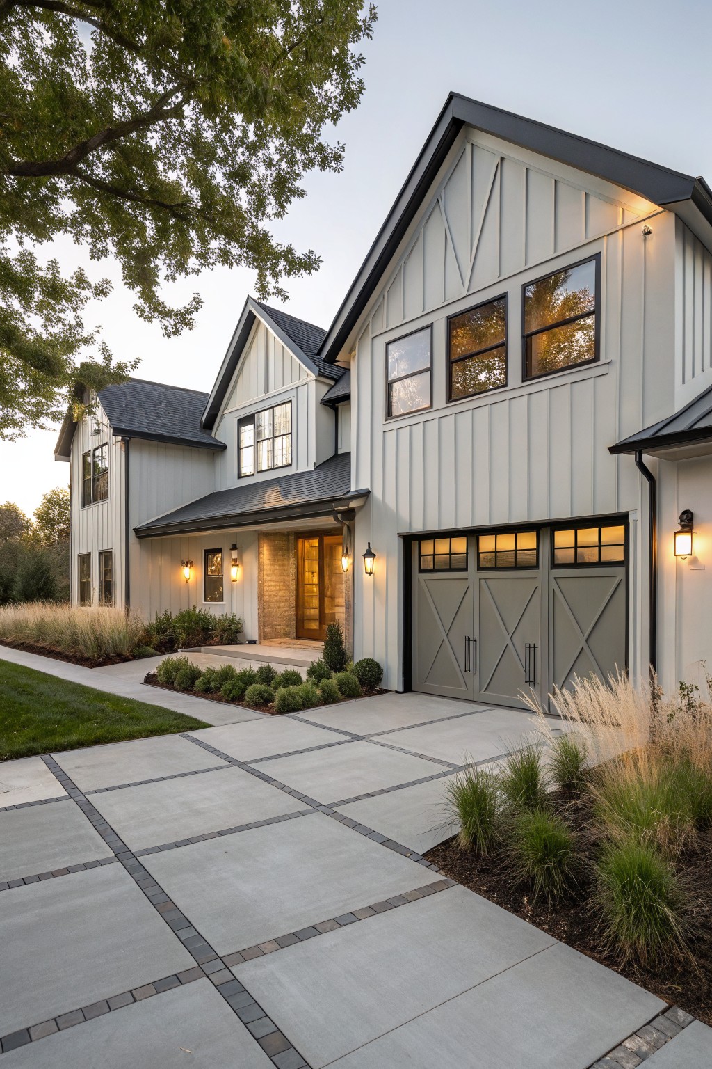 Light gray vertical siding on a farmhouse exterior with black windows and dark trim.