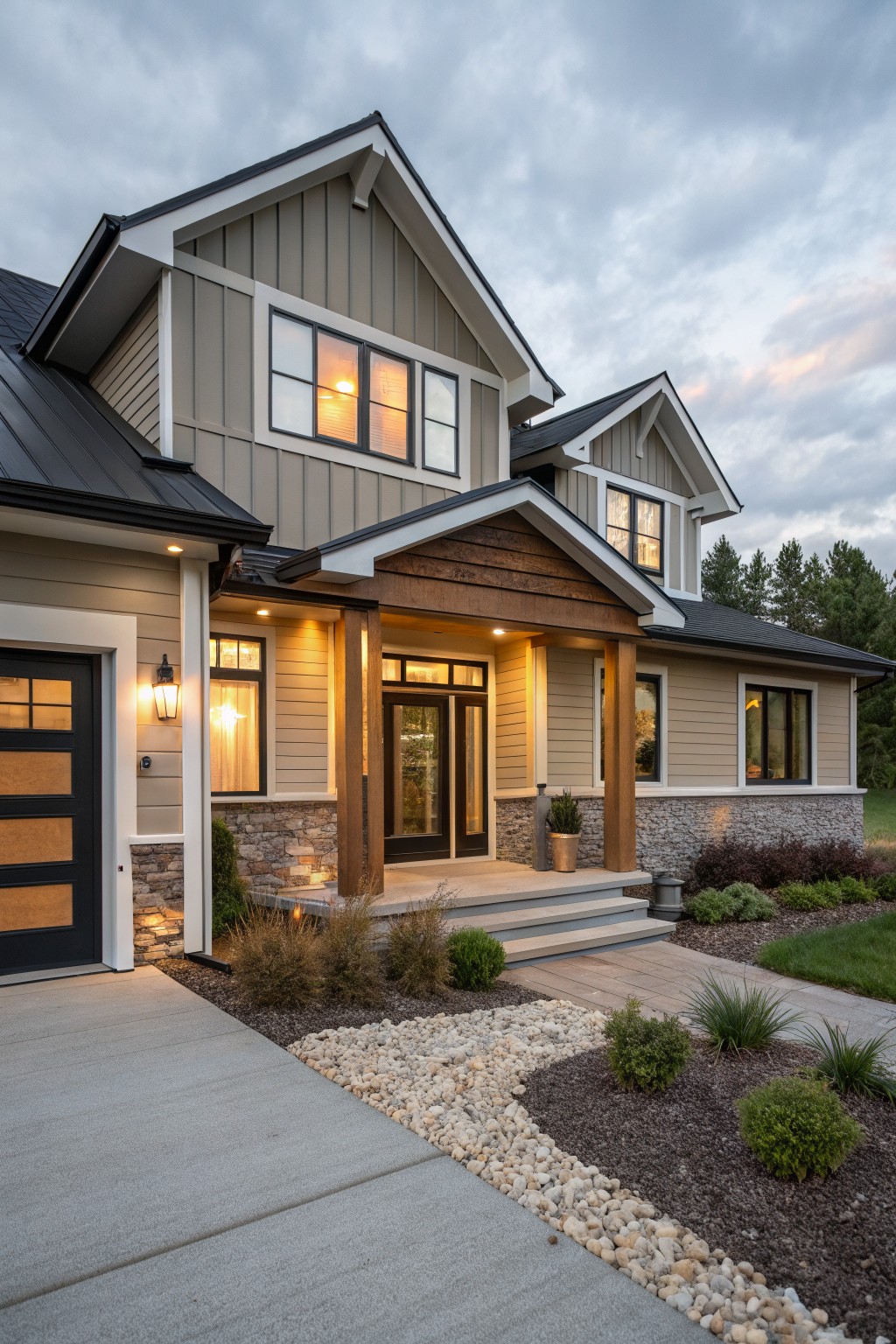 A two-story farmhouse with soft greige siding and dark trim.