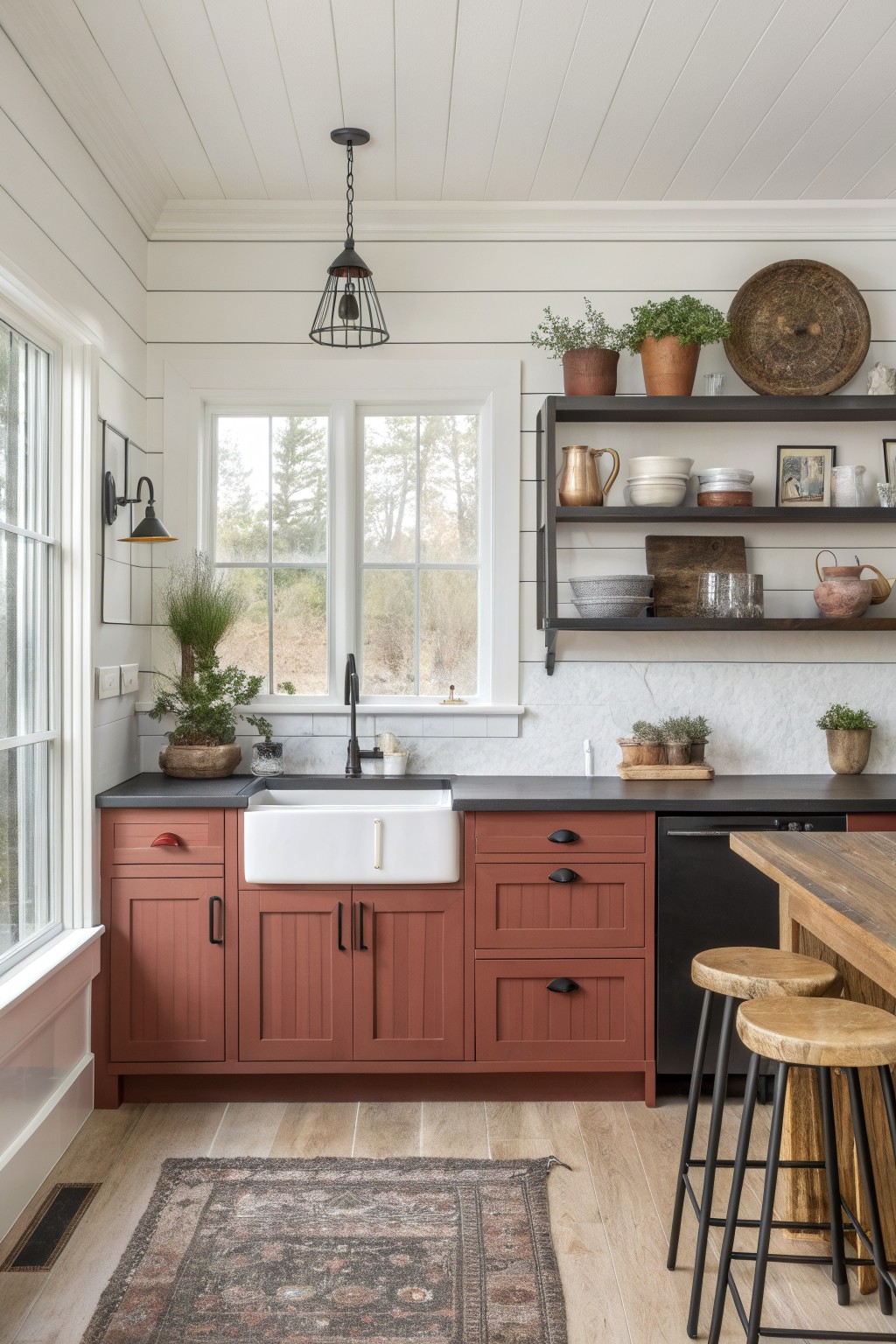Black open shelves mounted above a kitchen counter with red cabinets below.