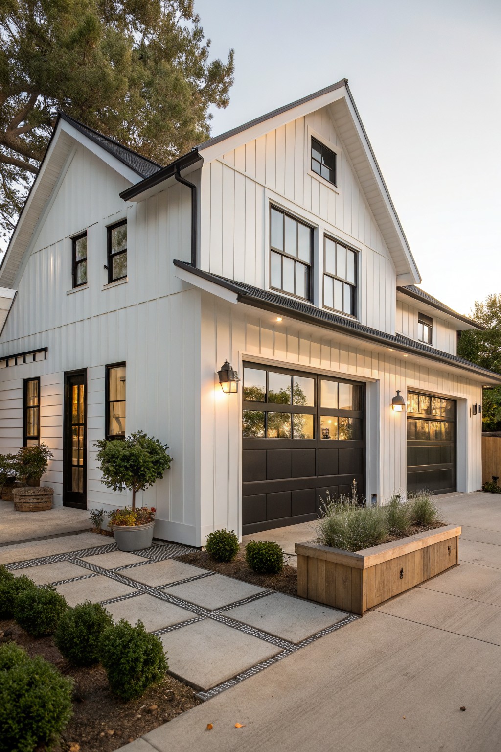 White vertical siding on a modern farmhouse exterior with dark trim and garage doors.