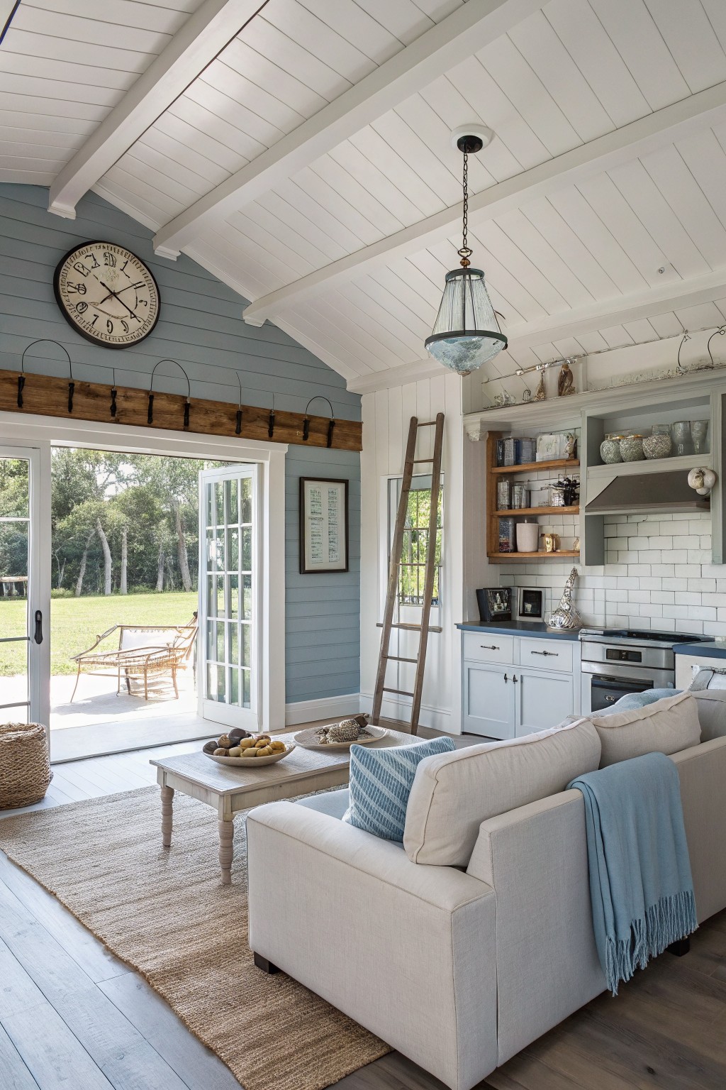 Living room walls painted in a soft blue gray with white trim and wood accents.
