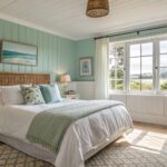 Light blue green walls in a bedroom with white trim and wood accents.