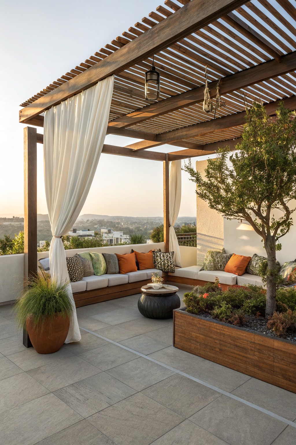 A rooftop patio with a wooden pergola over built-in cushioned seating, a large terracotta planter, and a wooden planter box with shrubs.