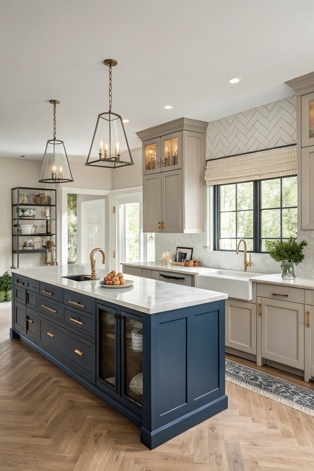 A kitchen island painted deep navy blue with white marble top and wood flooring.