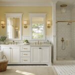 A bathroom with creamy white walls and built-in cabinetry.