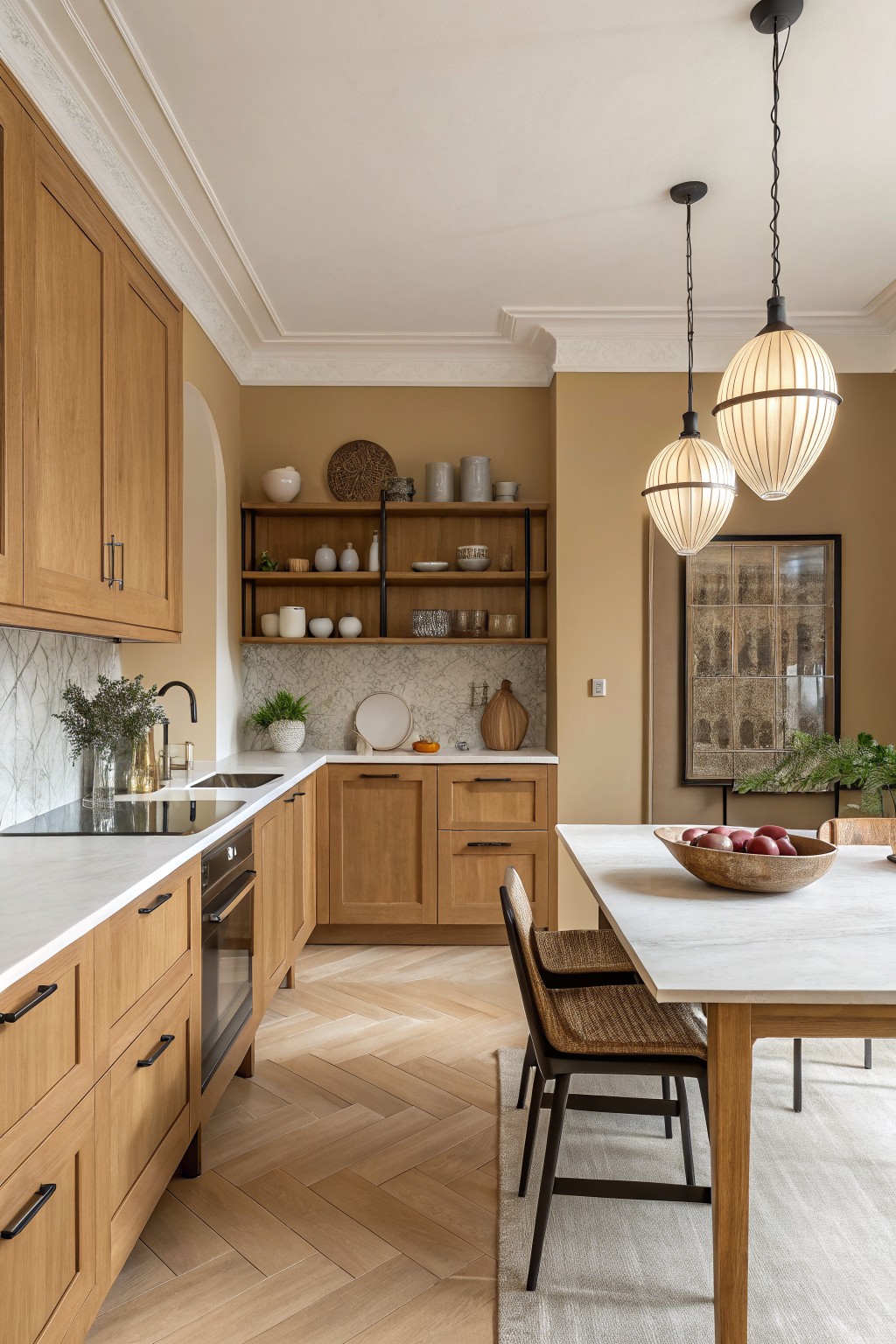 Kitchen with warm beige walls and light oak cabinets.