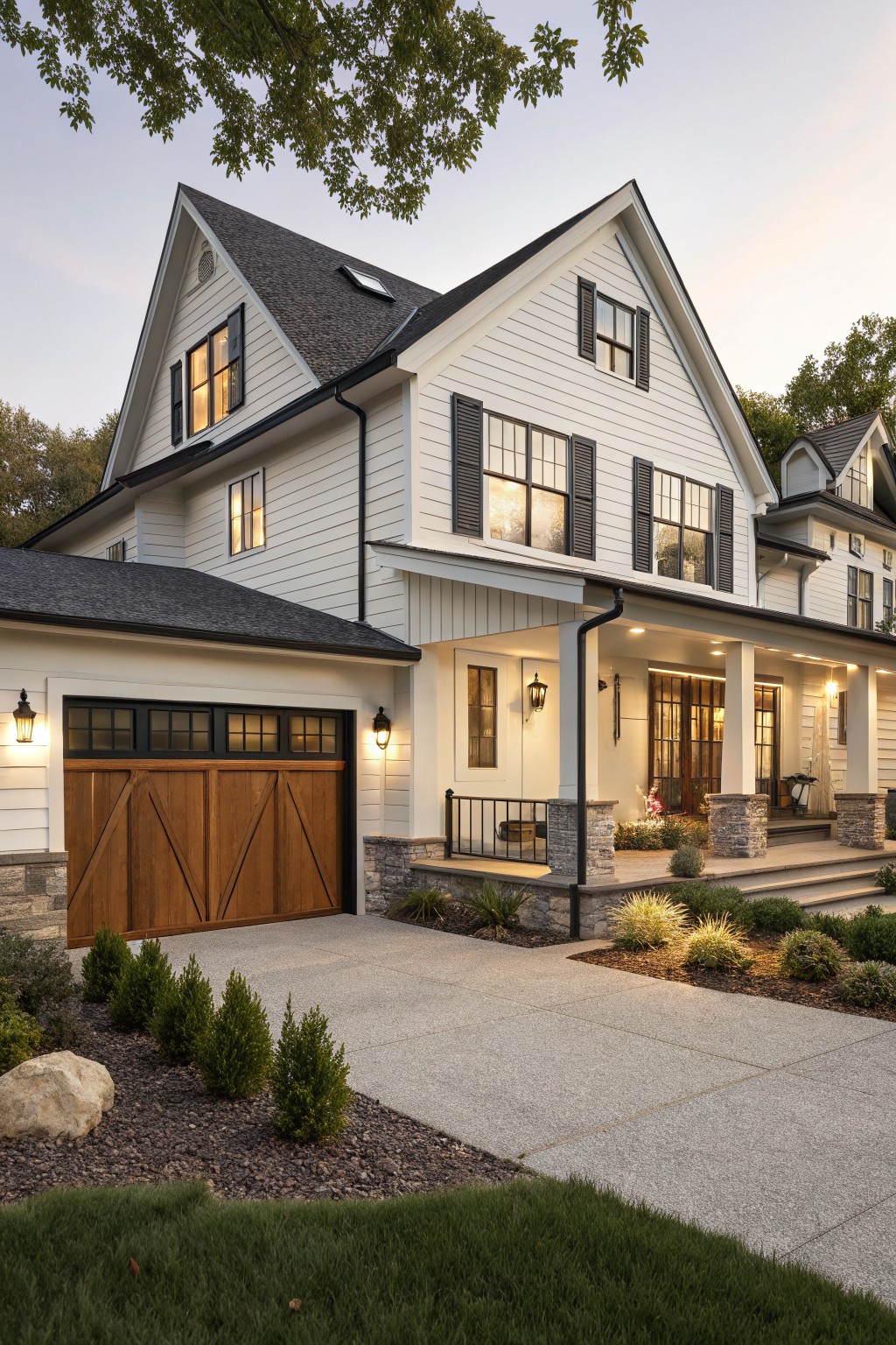 A house exterior with bright white siding and dark trim.