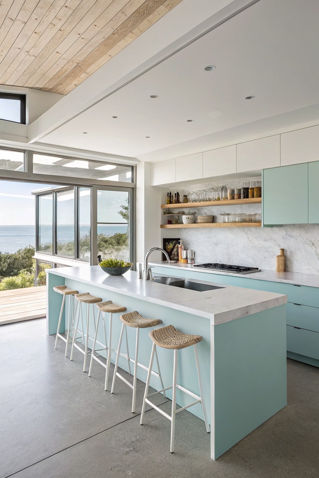 Light blue painted kitchen island with white bar stools.