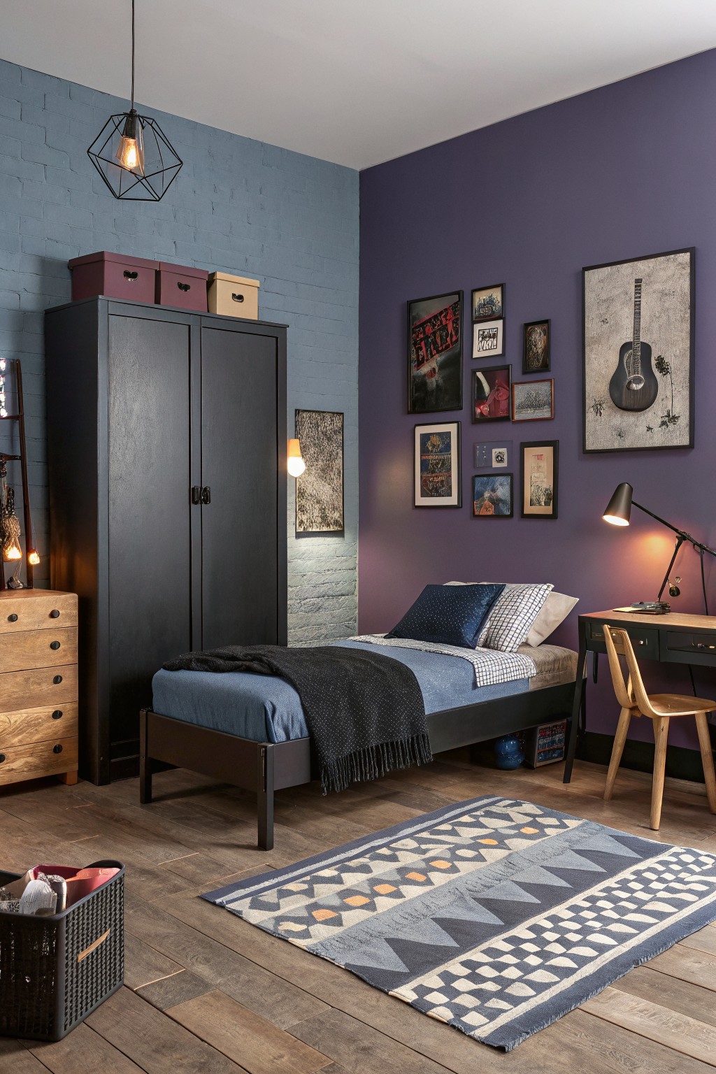 A bedroom featuring a deep purple accent wall next to a blue brick wall.