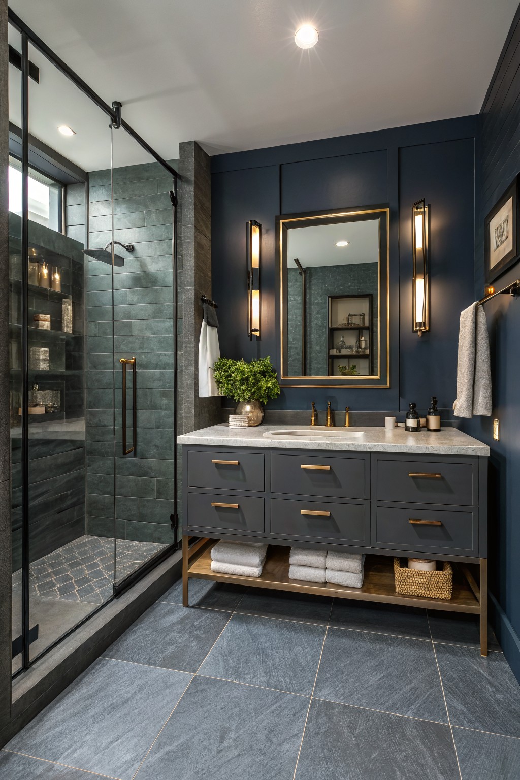 Modern bathroom with deep navy walls and a gray vanity.